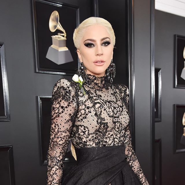Grammys 2018 performer, Lady Gaga sports a white rose on the red carpet in support of #TimesUp #grammys2018 #Buro247Singapore