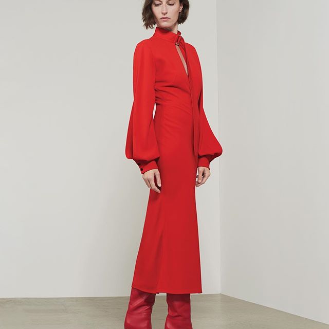 A contrast of toughness and femininity - the slash front midi dress, here with the red heel boot. All available at the link in bio or at #VBDoverSt x VB #VBPreSS19