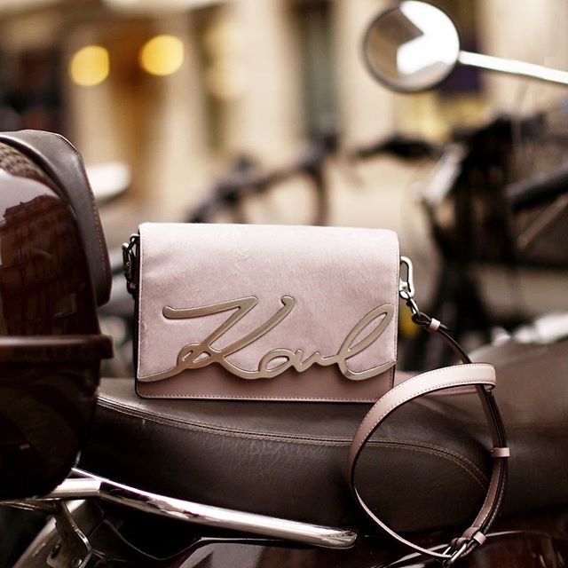 The perfect gift? Karl's signature bag in a shimmering shade of ballet pink. #KARLHOLIDAYS