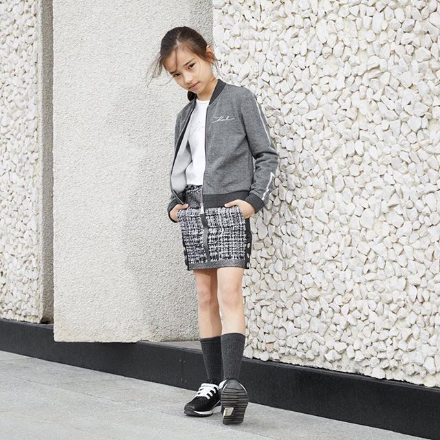 Comfy sneakers  tweed skirt  cosy sweat. This outfit ticks every box. #KARLHOLIDAYS