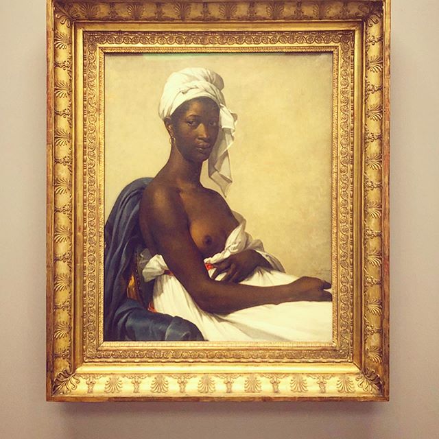 What s the best art show in Paris? That s easy.  Black Models: From Géricault to Matisse,  which is both a chronological survey of black figures in French painting from the revolution to the mid-twentieth century, and a radical modernization of how we view the models. Why? The museum literally changed the titles of the paintings to respectfully acknowledge the black subjects that feature them. So, (first pic) Marie-Guillemine Benoist s 1800 painting is now  Portrait of Madeline,  which was formerly  Portrait of a Black Woman.  (It had another title before that, but I ain t gonna say that word.) And (second pic) a painting from 1827 by Eugène Delacroix is listed as  Portrait of a Woman with Blue Turban,  updating its original title, which used more archaic vocabulary. Why is this such a big deal? As the art historian Anne Higonnet pointed out in the catalogue, what if Mona Lisa was titled  Portrait of a white woman ? That struck me. The show s original concept came from Denise Durrell s 2013 doctorate thesis at Columbia University, which was inspired by paintings that had heavily researched white models but neglected black figures, most notably (third pic) Édouard Manet s  Olympia  (1863). This painting, which is part of the museum s permanent collection, is the centerpiece of this exhibit. However, next to it is the part I found most moving in the whole show: Manet s diary from the 1860 s, which finally reveals the black model s real name: Laure. None of these pictures are new   and many of them I ve seen before   but this show positioned them in a new light, and for that I am grateful. At a time when race relations seem on the verge of regression (both in France and the US), renaming these portraits left me with a feeling of dignity and gratitude. It s up till July 21st!