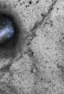 La Silla одон орон судлалын авсан том ба жижиг Megallanic Cloud. Гялалзсан цэнхэр өнгөтэй нь үүлнүүд бол хар, цагаан цэгүүд нь олон сая од юм