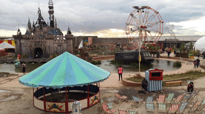 Бэнксигийн Dismaland-ыг дүрвэгсдийн лагерь луу шилжүүлэхээр болжээ