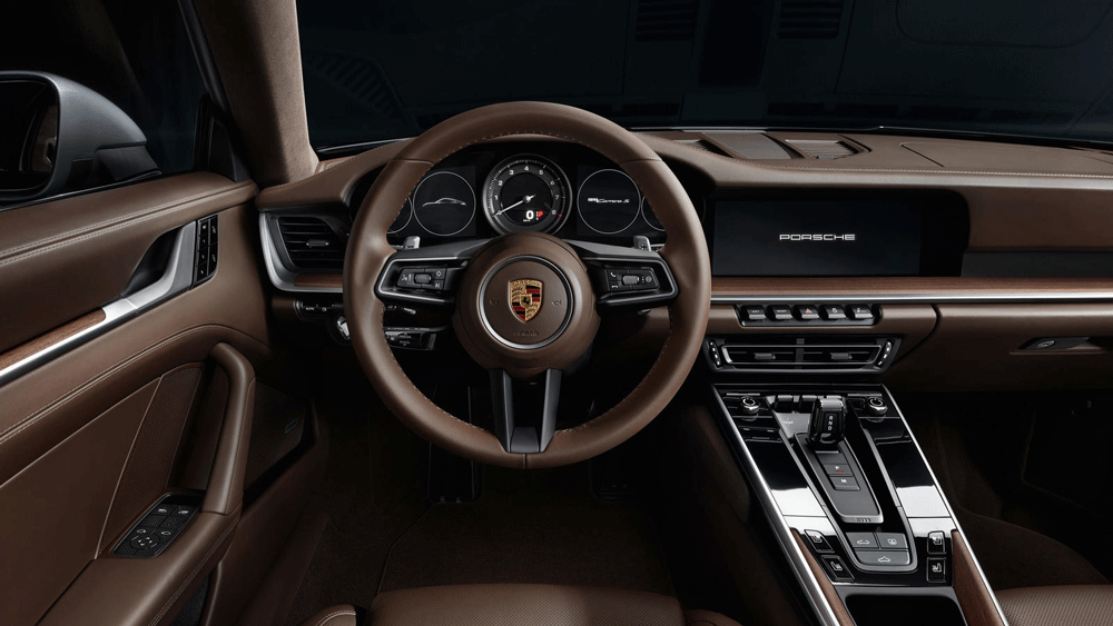 Цаг хугацаанд үл захирагдах унаа: Porsche шинэ 911 Carrera 4S  автомашиныг танилцуулж байна (фото 7)