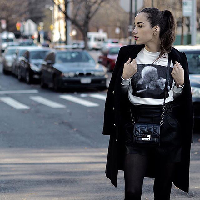 A monochrome look to wander in the cold for @amoureusedemode.  Get her look by clicking the link in our bio    #KARLLAGERFELD