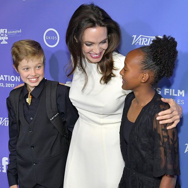 All grown up: #ShilohJoliePitt, #AngelinaJolie and #ZaharaJoliePitt attend the premiere of The Breadwinner in #Hollywood #Buro247Singapore
