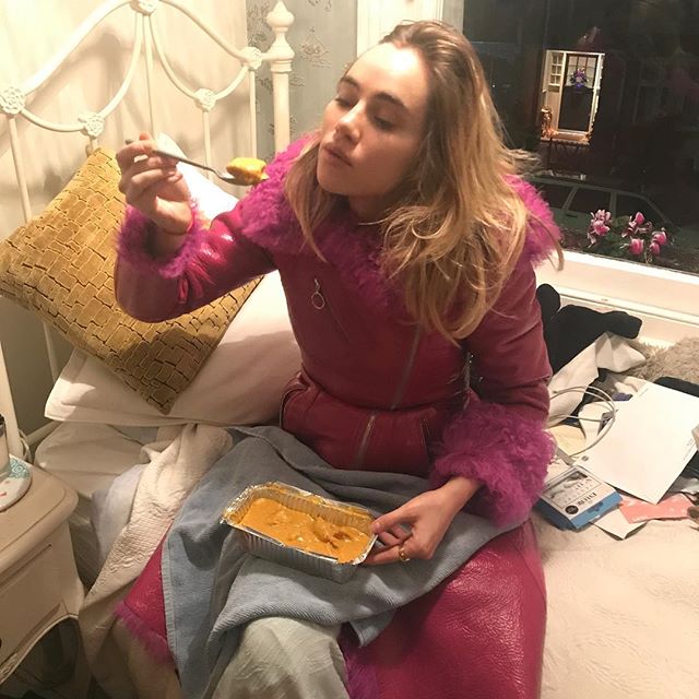 Curry on a bath mat on a bed?