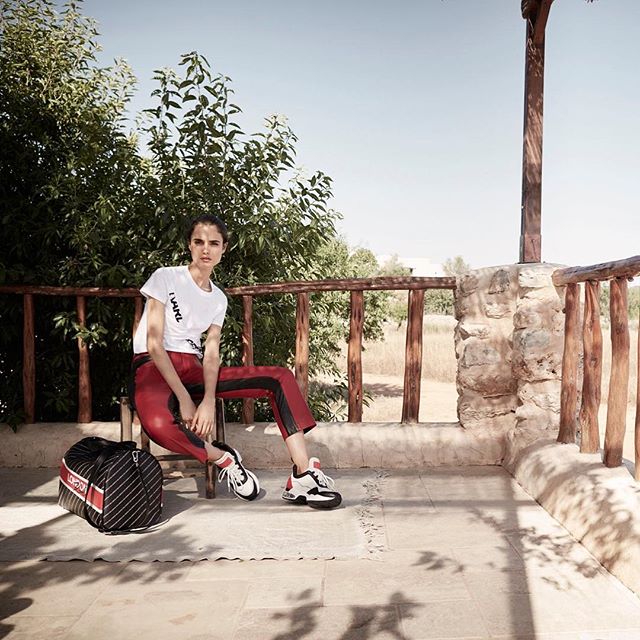 Friday mood: supersized sneakers and sophisticated leather pants. #KARLLAGERFELD