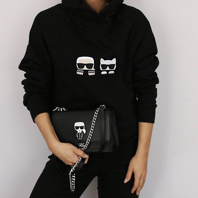 Your balanced Monday outfit? Pair a cozy soft hoodie with a chic handbag.  #KARLLAGERFELD