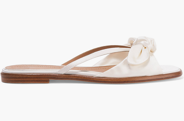 The Row<p><a href=\"https://www.net-a-porter.com/ua/en/product/709772/the_row/april-bow-embellished-silk-satin-sandals\" target=\"_blank\">net-a-porter.com</a></p>