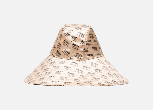 <p><a style=\"\" target=\"_blank\" href=\"https://www.farfetch.com/mn/shopping/women/gucci-ivory-invite-print-silk-hat-item-12617413.aspx?storeid=9359&amp;from=listing\">Gucci</a></p>